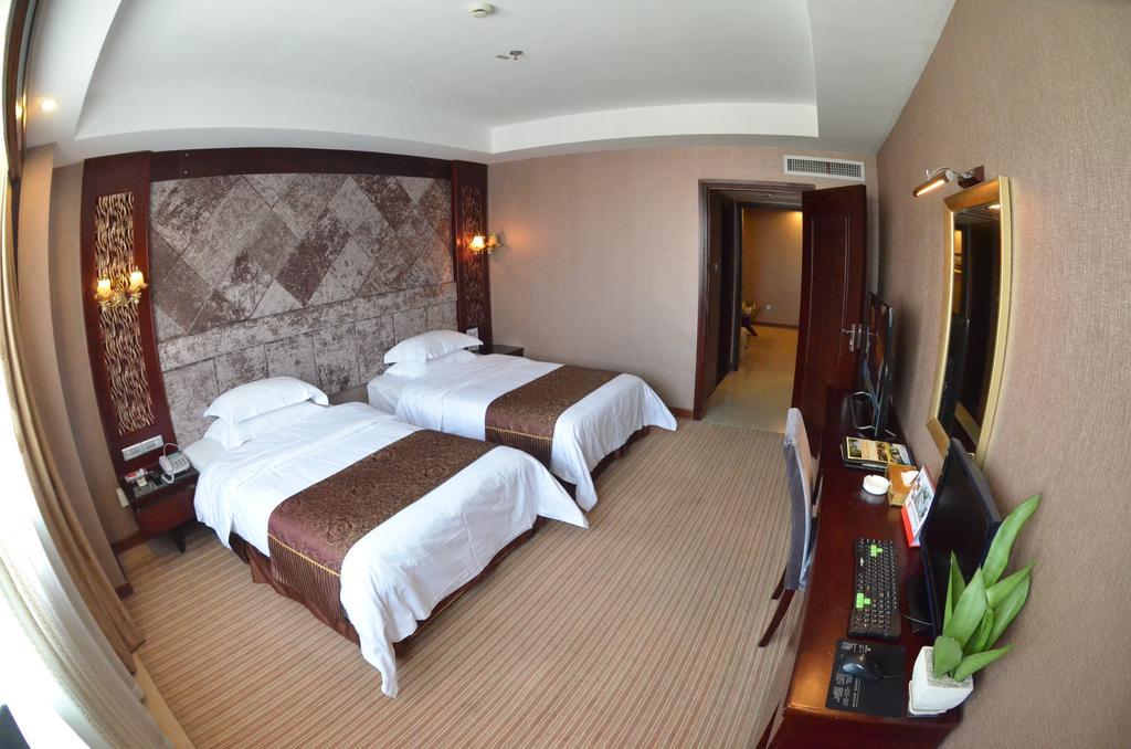 Xiamen Wanjia Oriental Hotel Zimmer foto