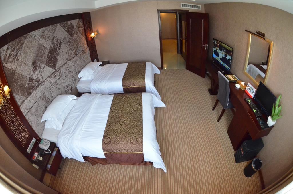 Xiamen Wanjia Oriental Hotel Zimmer foto